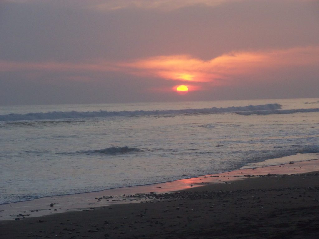 A beautiful image of Dominical beach at sunset in Costa Rica